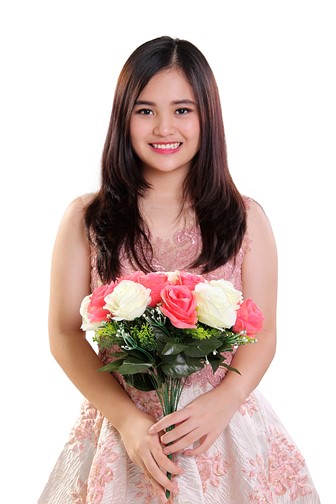 teenaged girl holding a bouquet of flowers