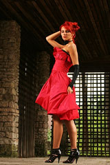 young woman wearing a red dress - fashion portrait