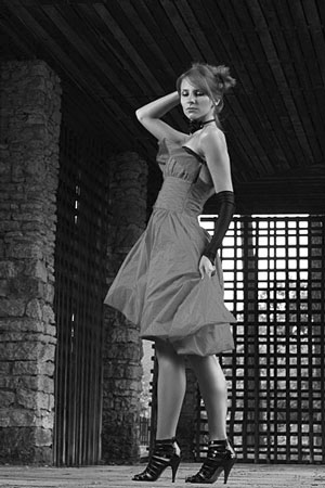 young woman wearing a stylish dress - fashion portrait